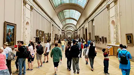 people walking in art gallery