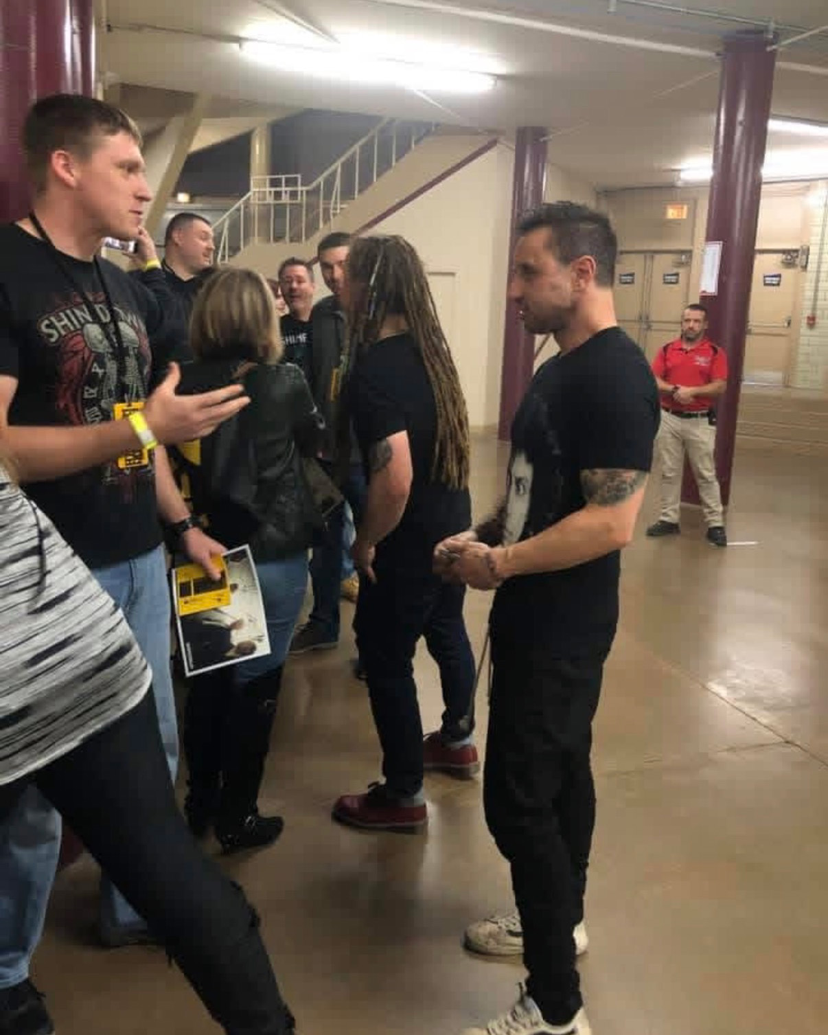 band members signing autographs