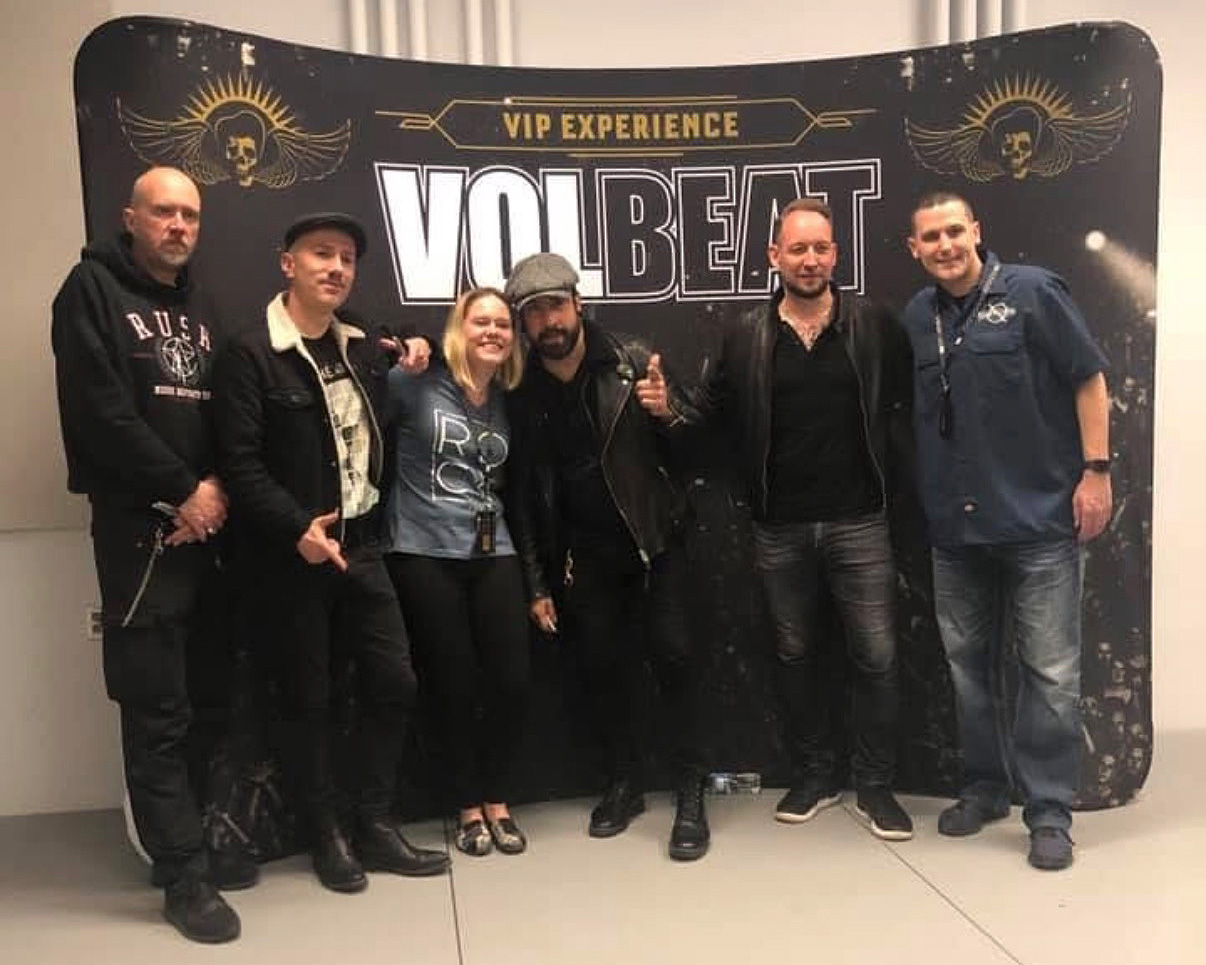 group photo with the band